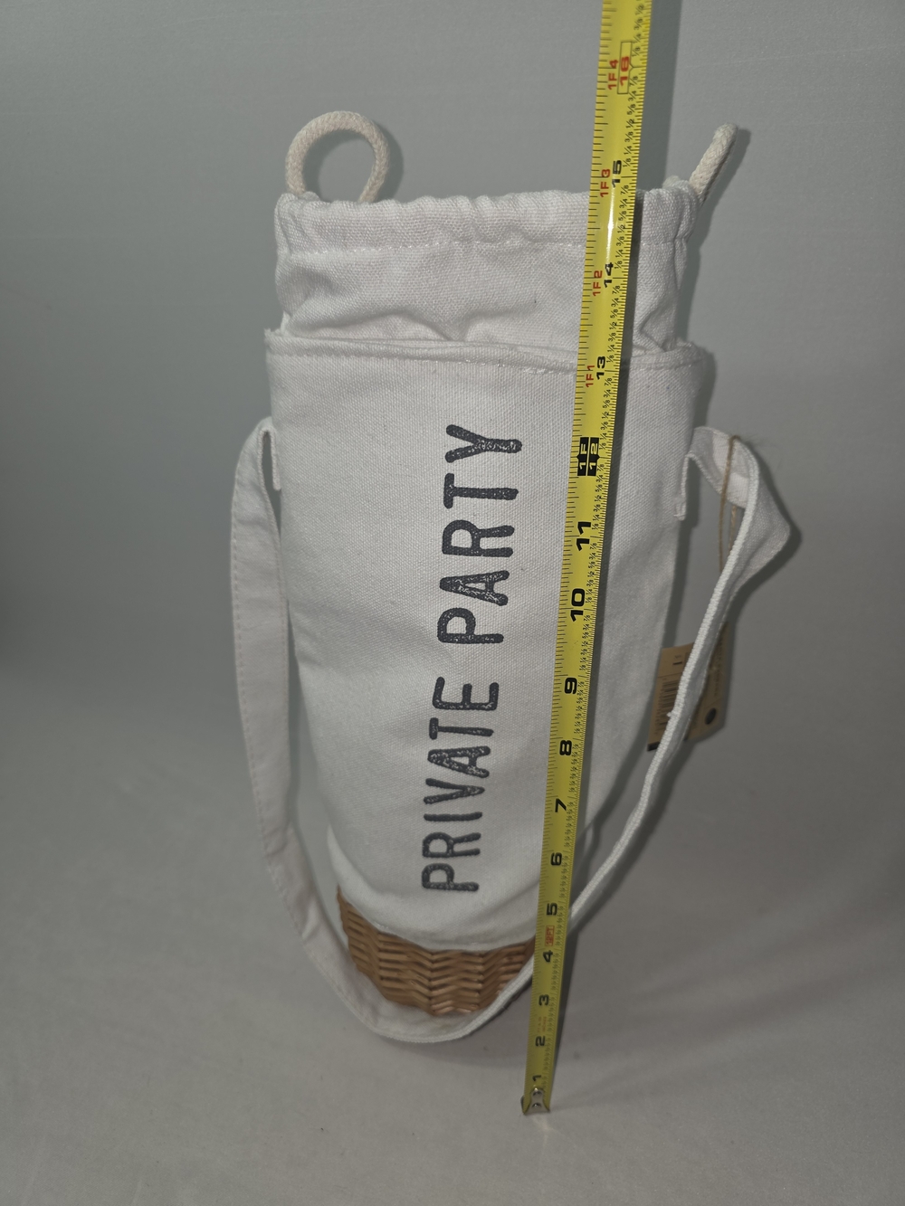 PRIVATE PARTY White Canvas and Wicker Drawstring Crossbody Bottle Bag - Picture 7 of 11